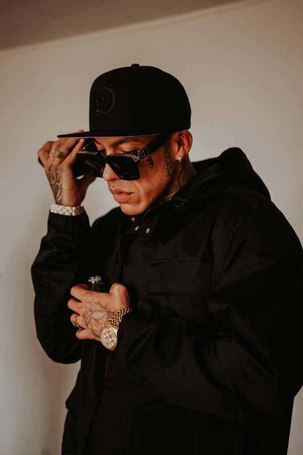 Stylish Man With Sunglassesand Cap Wallpaper