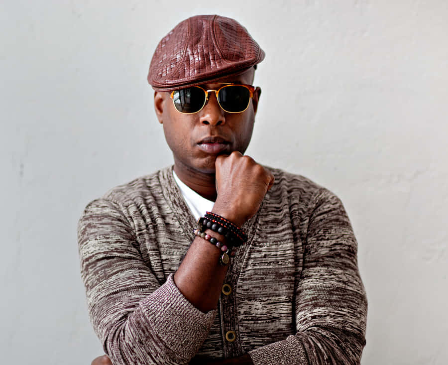 Stylish Music Artist Posing Wallpaper