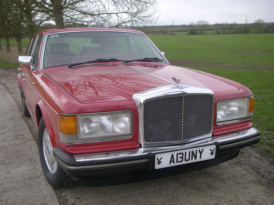 Stylish Vintage Bentley Eight On The Road Wallpaper