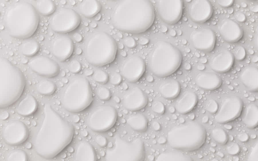 Stylish Woman With Turquoise Jewelry And White Dress Wallpaper