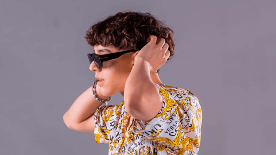 Stylish Youth Sunglasses Pose Wallpaper