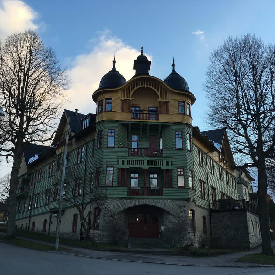Sunlight Cascading Over Beautiful Norrköping Cityscape Wallpaper