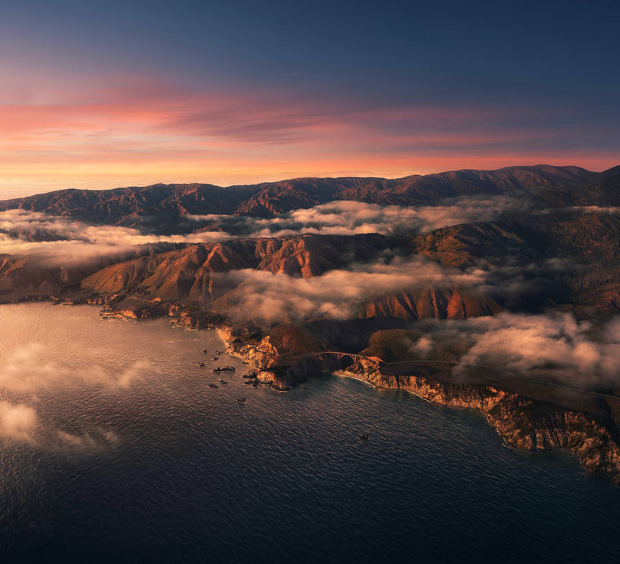 Sunset On Huge Island Macos Wallpaper