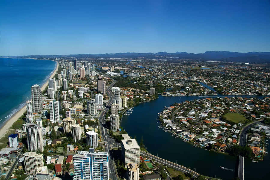 Sunset Over Brisbane Skyline Wallpaper