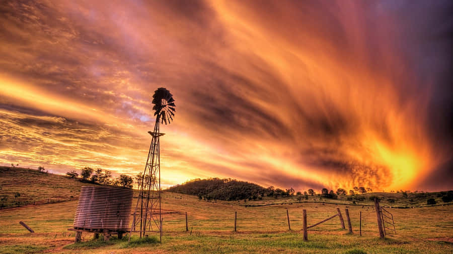 Sunset Over Rustic Farm Wallpaper