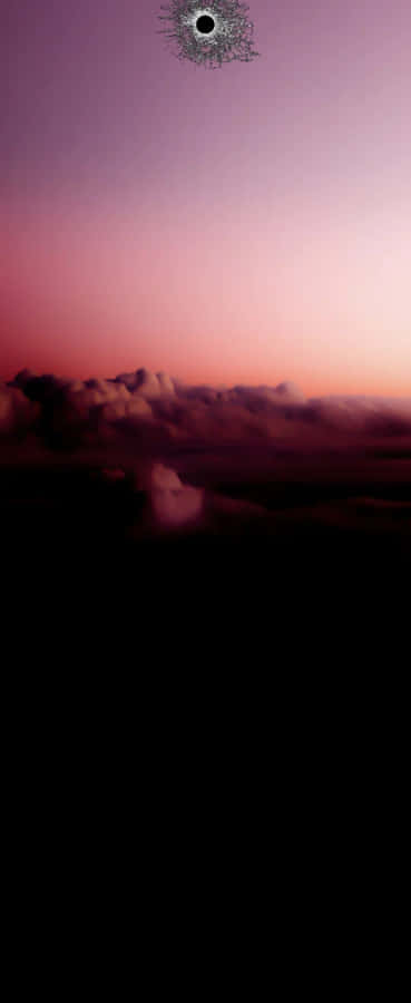 Sunset Skywith Cracked Screen Texture Wallpaper