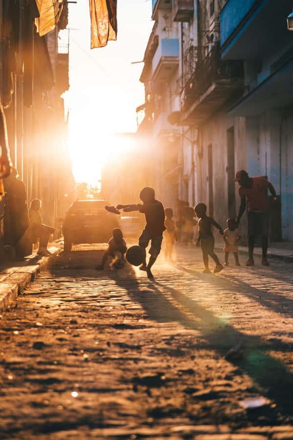 Sunset Street Soccer Game.jpg Wallpaper