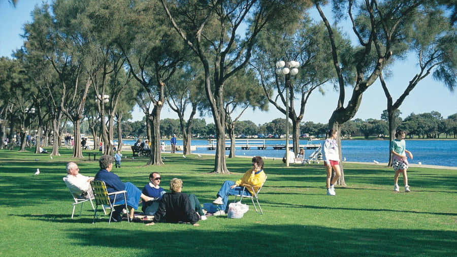 Sunset View Of Mandurah Foreshore With Tranquil Waters Wallpaper