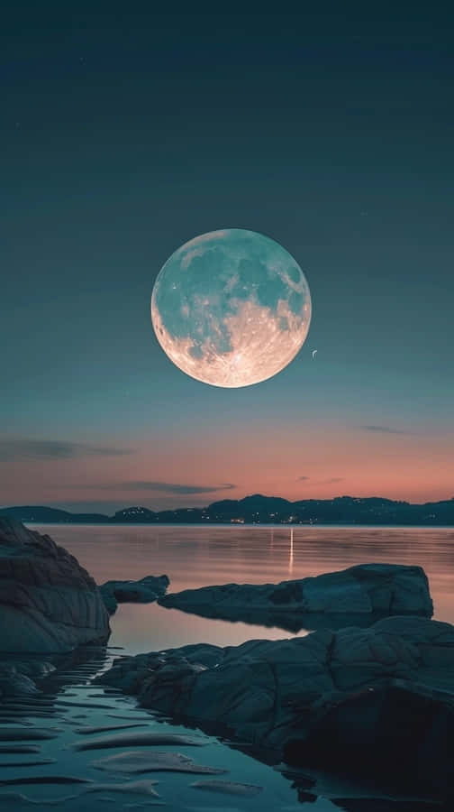 Surreal_ Moonrise_ Over_ Coastline.jpg Wallpaper