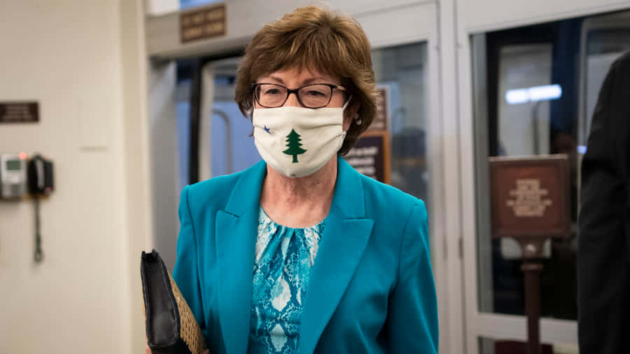 Susan Collins In A Facemask Wallpaper
