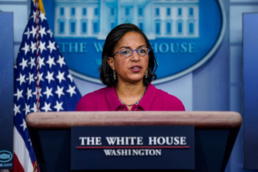 Susan Rice Speakingat White House Podium Wallpaper