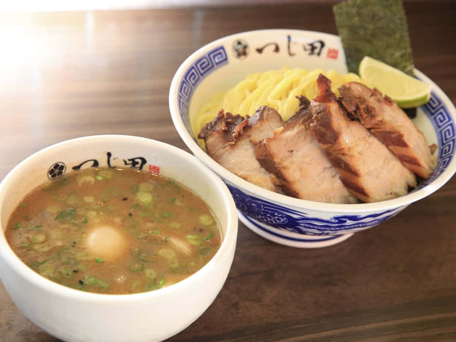 Tempting Bowl Of Savory Pork Ramen Wallpaper