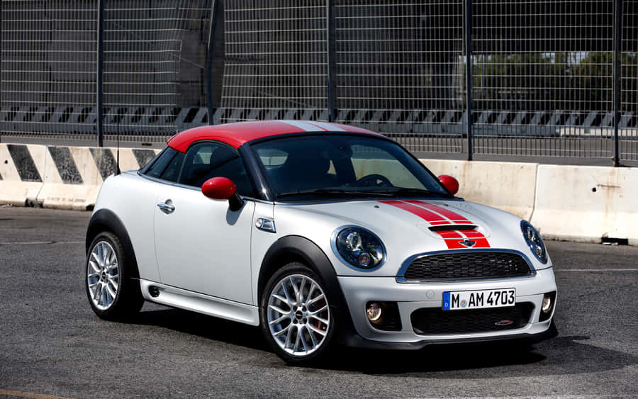 The Alluring Mini Roadster In Vibrant Red Wallpaper