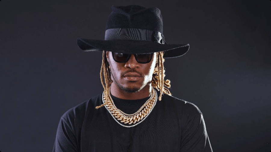 The Astounding Vision Of Future Rapper In A Black Hat Wallpaper