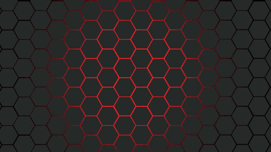 The Clean Lines Of Black Carbon Fiber Against A Stark Background Wallpaper