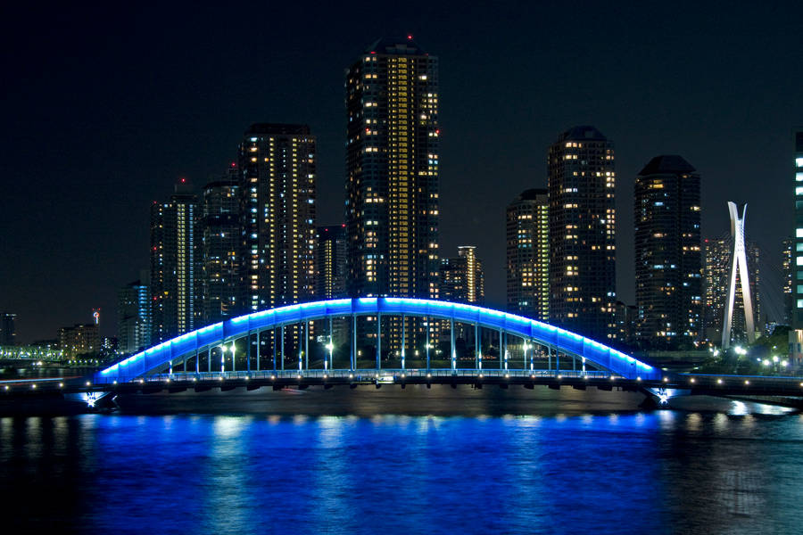 The Glowing Blue Eitai Bridge In Tokyo, Japan Wallpaper