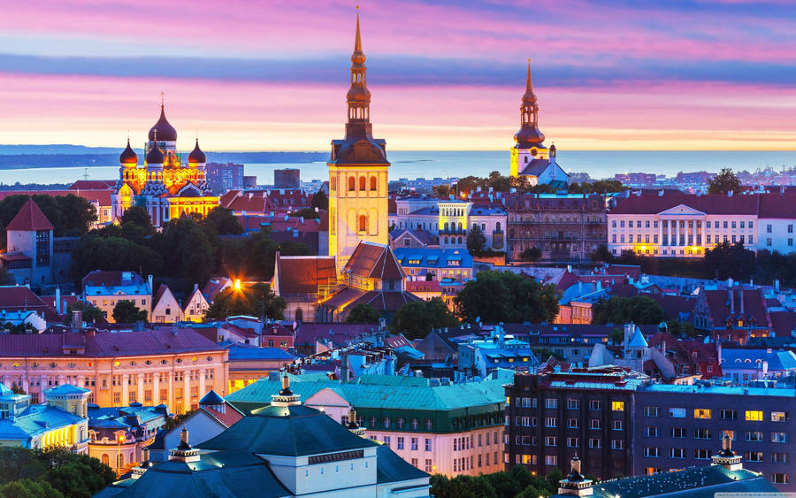 The Lights On The City Skyline Create A Beautiful Scene Wallpaper