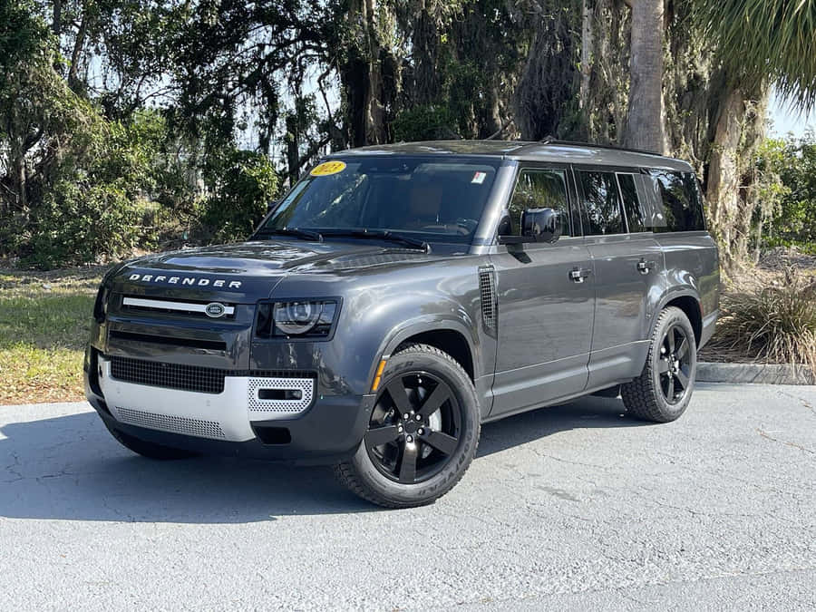The Rugged Elegance Of The Land Rover Defender Wallpaper