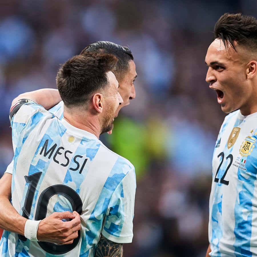 Thiago Almada With Teammate Superstar Messi Wallpaper