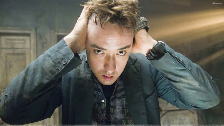 Thoughtful John Cusack Posing For A Photoshoot Wallpaper