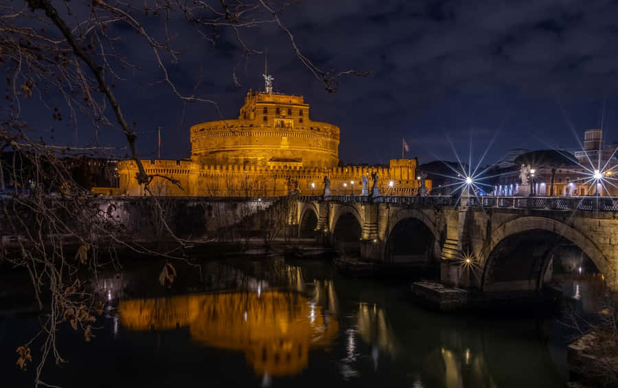 Tiber River In Castel Santangelo At Night Wallpaper