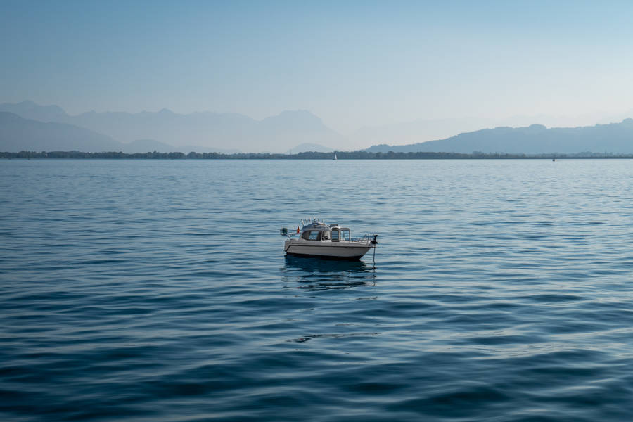 Tiny White Boat Wallpaper