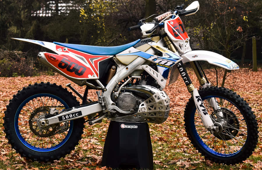 Tm Racing Dirt Bike In Action Wallpaper