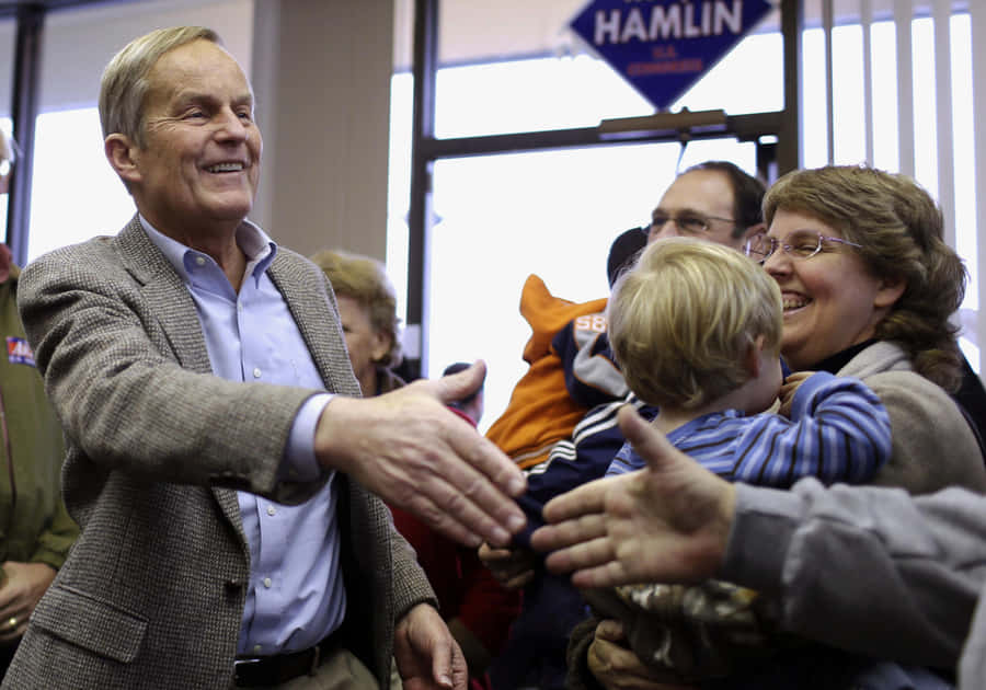 Todd Akin Engaging In A Handshake Wallpaper