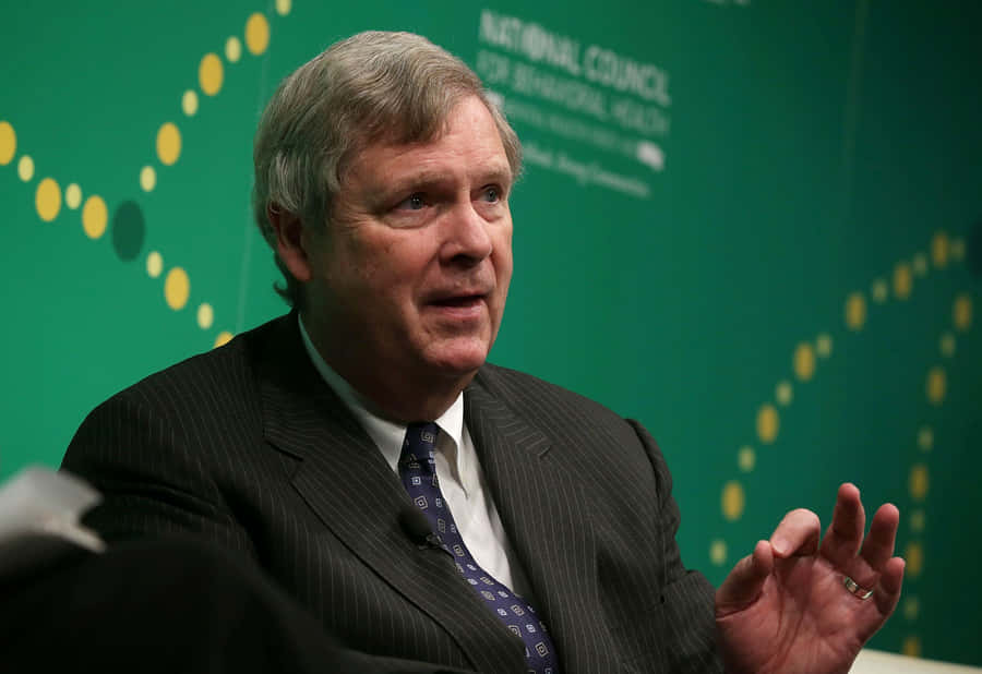 Tom Vilsack Encouraging Americans Wallpaper