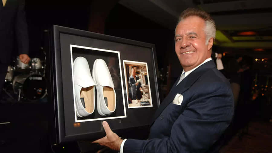 Tony Sirico Exuding Confidence In A Stylish Suit Wallpaper