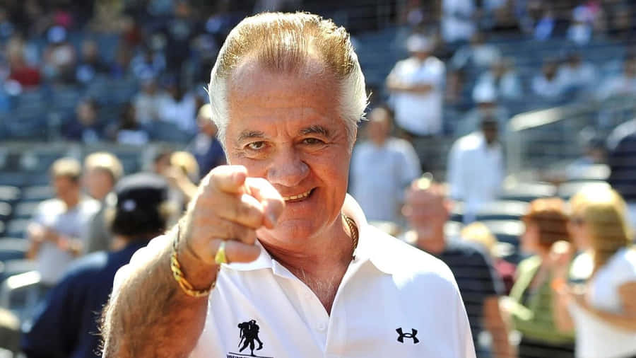 Tony Sirico Strikes A Pose In Character As Paulie Walnuts Wallpaper