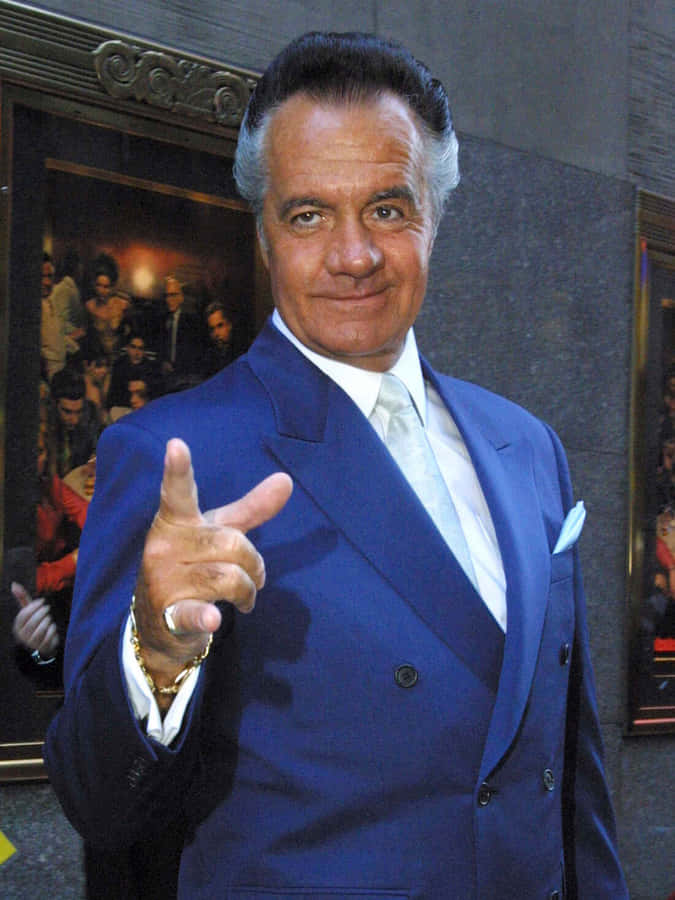 Tony Sirico Striking A Pose In A Black Suit Wallpaper