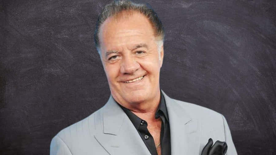 Tony Sirico Striking A Pose In A Classy Suit. Wallpaper