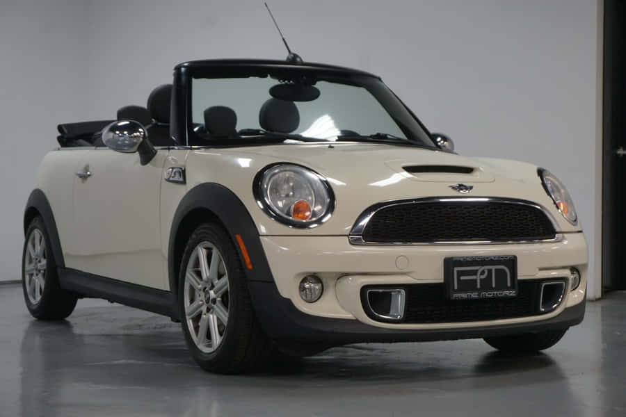 Top-down Driving Excitement: Mini Cooper S Convertible Wallpaper
