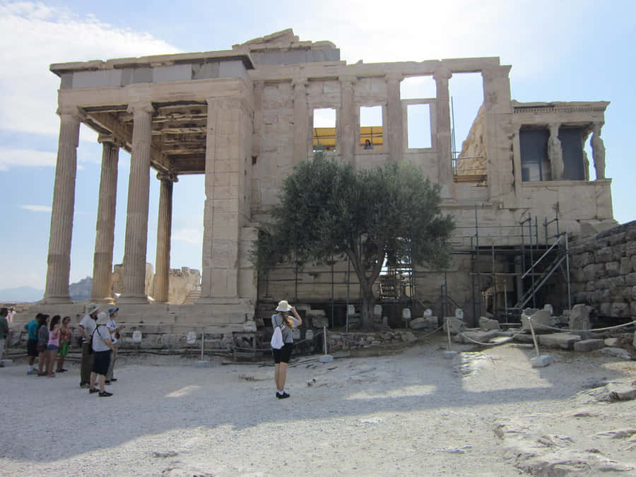 Tourists Around The Erechtheion Wallpaper