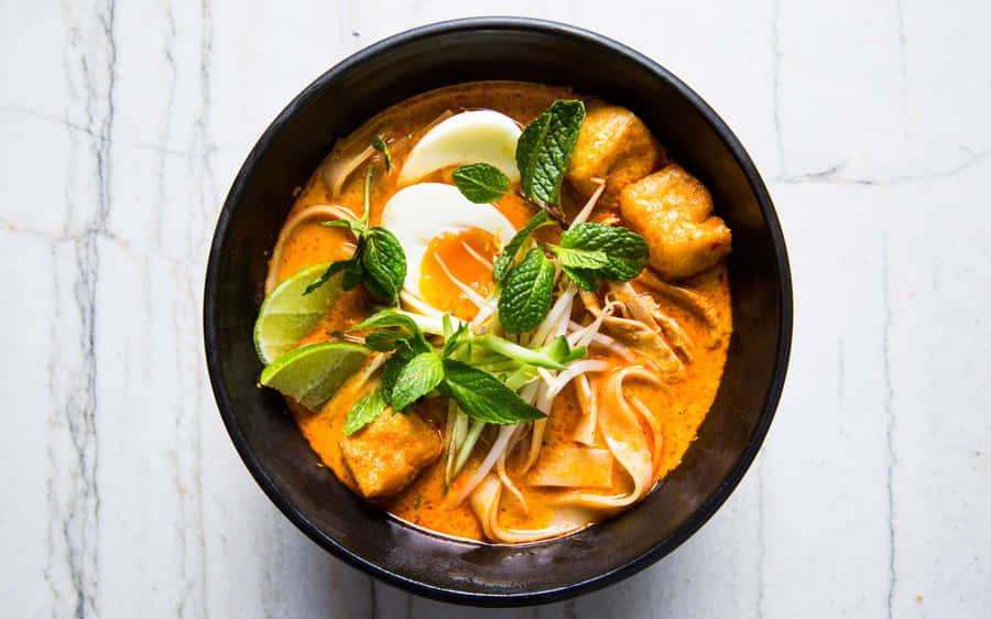 Traditional Curry Laksa Deliciously Prepared With Flat Vermicelli Wallpaper