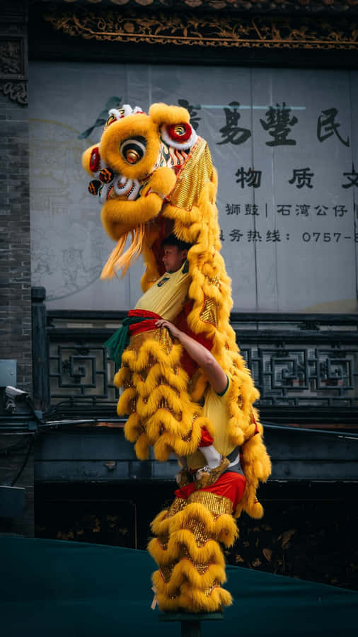 Traditional Yellow Lion Dance Wallpaper