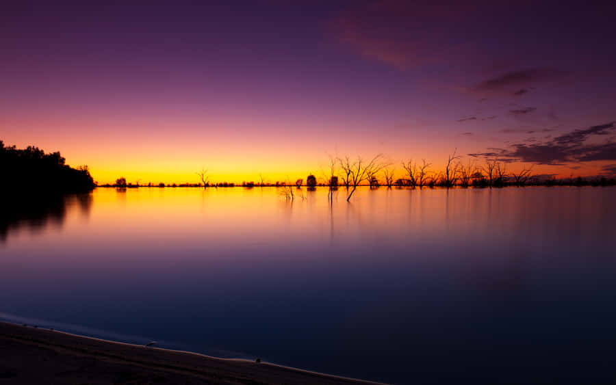 Tranquil Fall Sunset At The Lakeside Wallpaper