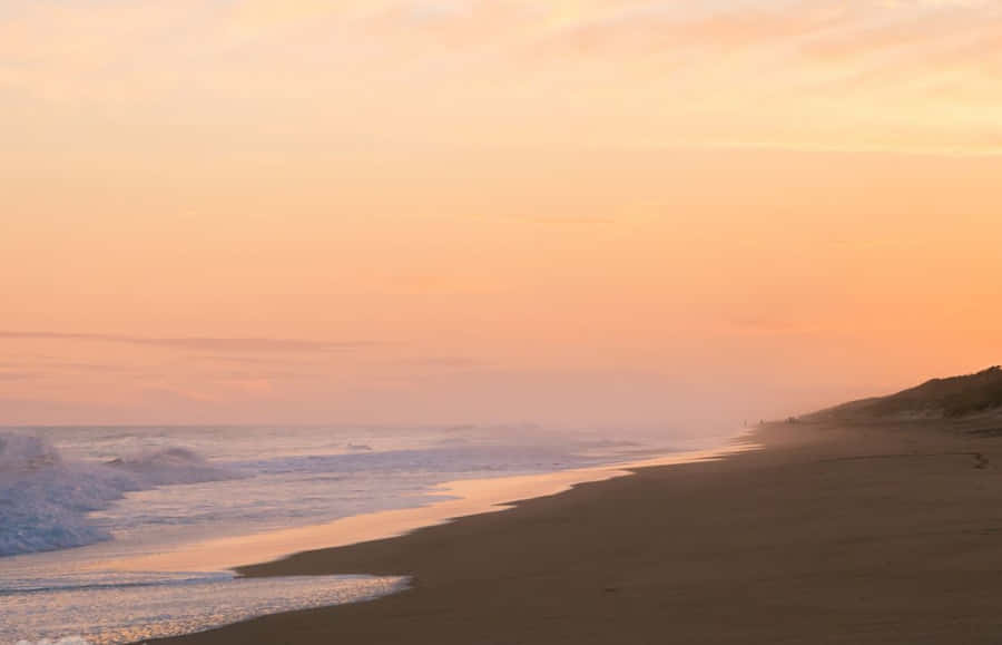 Tranquil Sea Breeze Along The Shoreline Wallpaper