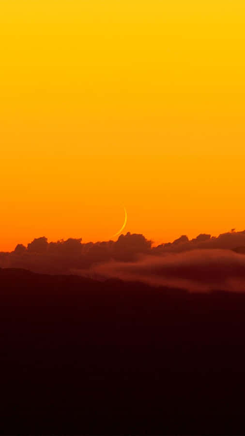 Tranquil Yellow Sunset At The Beach Wallpaper