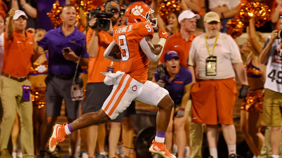 Travis Etienne Clemson Football Action Wallpaper