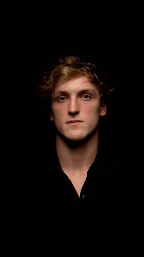 Trendsetter Logan Paul In Bold Red Jacket Wallpaper