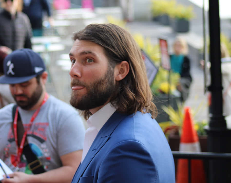 Trevor Williams Contemplating Strategy In A Baseball Game Wallpaper