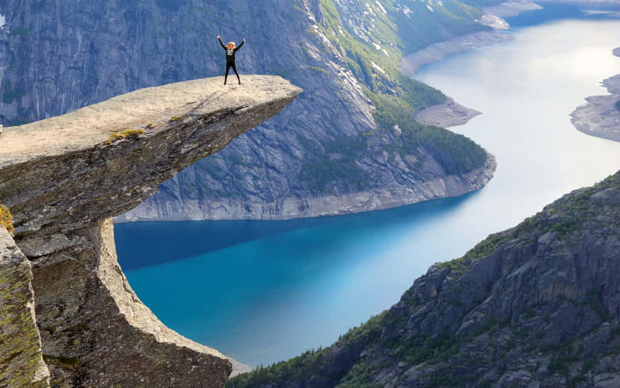 Trolltunga Victory Pose Stavanger Norway Wallpaper
