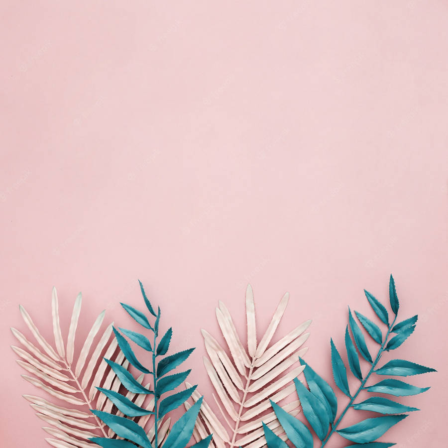 Tropical Leaves On Pastel Pink Background Wallpaper