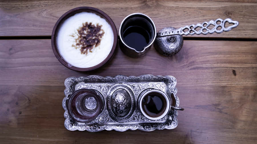 Turkish Coffeeand Rice Pudding Setup Wallpaper