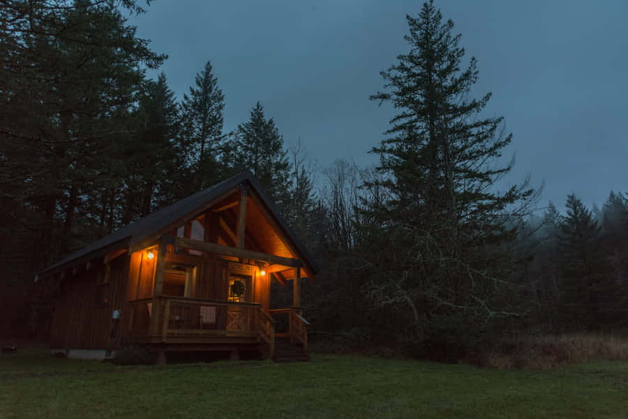 Twilight Log Cabin Retreat Wallpaper