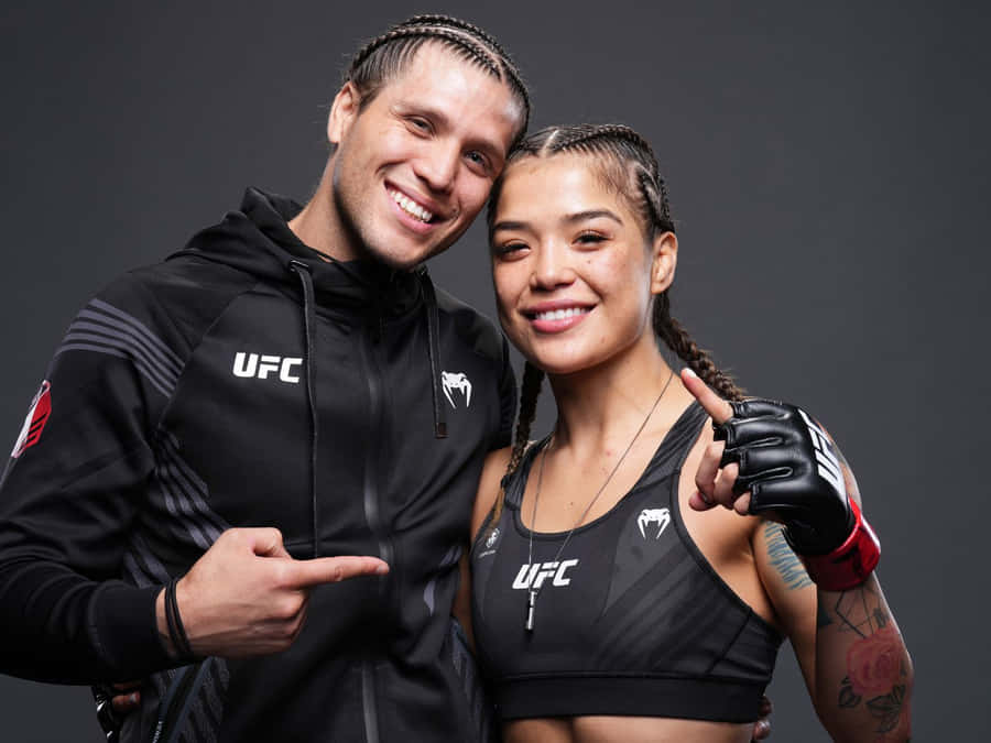 U F C Fighters Smiling Together Wallpaper