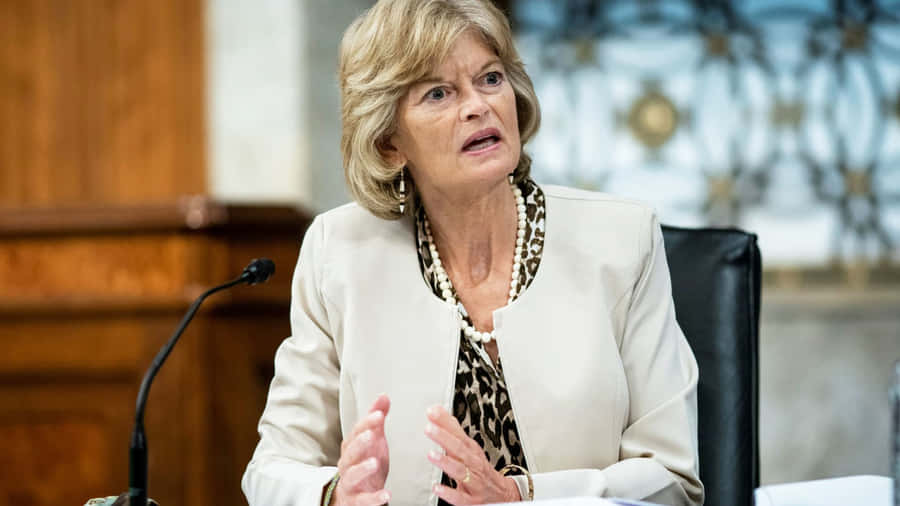 U.s. Senator Lisa Murkowski In A Formal White Outfit Wallpaper