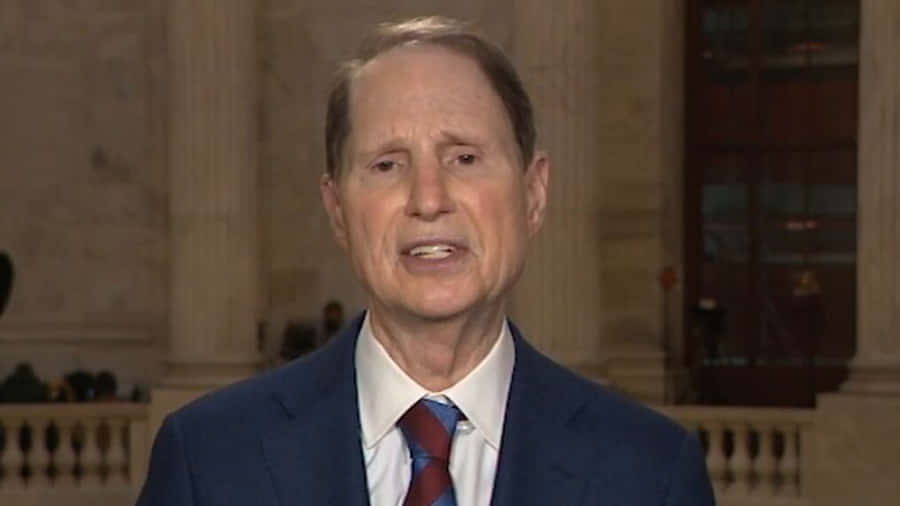 U.s. Senator Ron Wyden In Deep Discussion Wallpaper